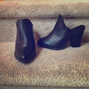 Very cute black mules.